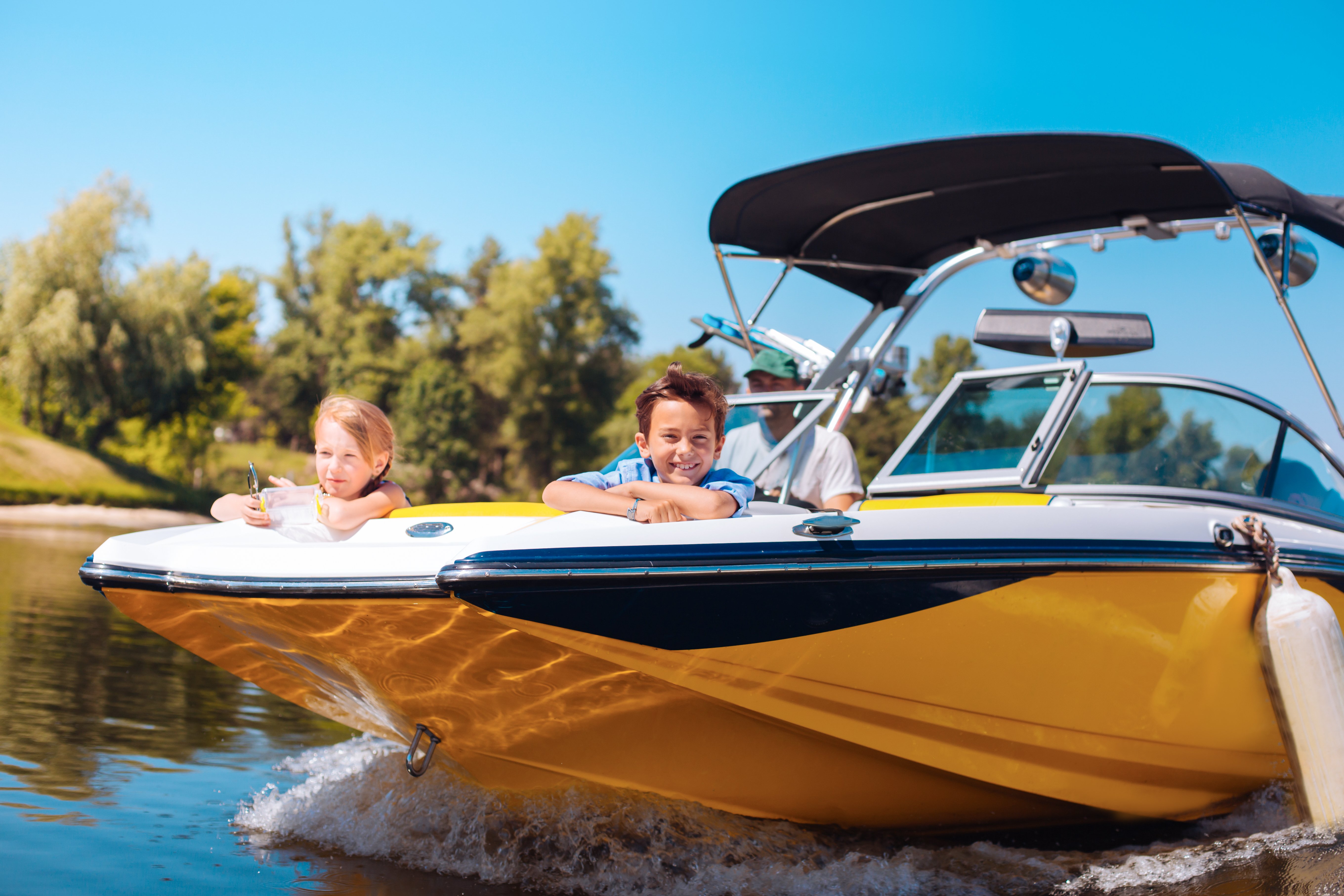kids on boat in summer