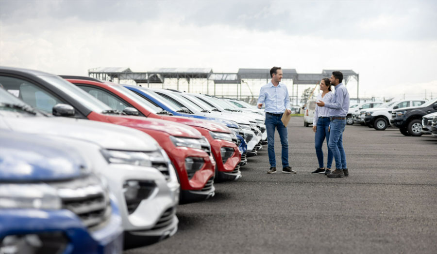 couple buying a new car